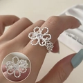 Vintage silver hollow flower ring with sparkling zircon stone and elegant petal design - Hollow Petal Single Zircon(JZ7298)