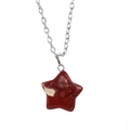 Macro detail of star-shaped red jasper stone pendant with polished silver chain - Red Jasper