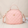 Chic pink quilted handbag with gold-tone hardware and elegant four-leaf clover charm - Pink