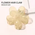 Detail of candy-colored flower hair claw in translucent yellow with metallic spring - Jelly Flower Hair Clip - Light Yellow