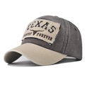 Macro view of washed cotton baseball cap with TEXAS COUNTRY embroidery and bull skull patch - Adjustable / Texas Longhorn Coffee