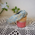 Blue and beige woven raffia headband with a stylish knotted design in a vintage style - Blue Series Interwoven Knotted
