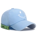 Light blue cotton baseball cap with white smiley face embroidery and neon green smile strap - Adjustable / Light Blue