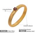 Gold stainless steel stretch bracelet featuring a rectangular red gemstone center - 1.2cm Wide / Gold Red Zirconia