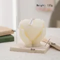 White heart held by hands scented candle with swirl texture on a stone tray - Hand Holding Heart(83) / Cream White