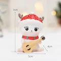 Figurine de renne de Noël mignonne avec chapeau rouge et guitare pour table - Renne à la Guitare