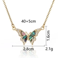 Macro shot of gold butterfly pendant with colorful shell inlay and dimensions markers - Gold Dreamy Butterfly Shadow Necklace