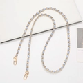 Detail of light blue leather woven with gold metal chain strap and lobster clasps - Light Blue
