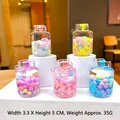 Five luminous snowflake gas tank keychains in vibrant colors with liquid sand detail - 1 Piece / Luminous Snowflake Tank Shape