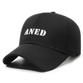 Classic black cotton baseball cap featuring white ANED embroidery with an adjustable strap - Black With White Embroidery