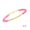 Detail of beaded bracelet with gold beads, rose chalcedony, and adjustable lobster clasp - Rose Red Chalcedony Flat Bead