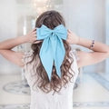 Large vintage blue ribbon bow hair clip made of satin fabric for an elegant back view - Spring Clips / Sky Blue