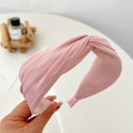 Close-up of pink pleated fabric headband showing soft texture and elegant design - Pink