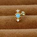 Gouden roestvrijstalen geometrische oorsteker met turquoise centrum en zirkoon-accenten - Goud