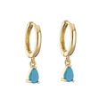 Detail of gold hoop earrings with teardrop turquoise stone pendants on white background - Turquoise