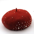Close-up detail of dark red wool beret featuring elegant white pearls and rhinestones - M / Dark Red