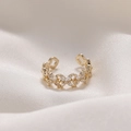 Elegant gold cuff ring with marquise and round crystals on white silk fabric background - Style B Butterfly