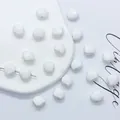 Polished white shell-shaped ceramic beads for DIY jewelry making and handmade accessories - 12mm / White