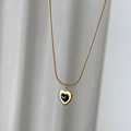 Elegant gold heart pendant necklace with black center on a sleek snake chain - Gold Black Heart Necklace