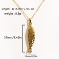 Gold tropical fish pendant necklace in titanium steel with detailed scales on white background - Large Long Fish (Fish 3)