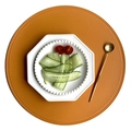 Orange round faux leather placemat with white ceramic plate and golden spoon set - Pressed Edge Faux Leather Round / Orange