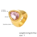 Macro detail of chunky 18K gold plated steel ring with a large pink teardrop zircon - US 7 / Gold Pink Zirconia