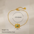 Dettaglio del bracciale in acciaio inossidabile dorato con pendente turchese e misure - Pino Africano Oro