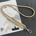 Close-up of champagne gold 8mm woven crossbody phone strap with silver adjustment buckle - 8mm Dual Adjustable / Gold