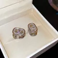 18k vergulde ovale V-logo oorbellen met zirkonia in Franse paleisstijl - Ovale V-Logo Stijl (WE4175) / Zilver