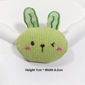 Detail of a 7x6.2cm light green striped bunny fabric patch with green embroidery - Green Bunny
