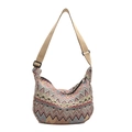 Minimalist knit canvas crossbody bag with colorful wave patterns and beige shoulder strap - Pink Without Charm