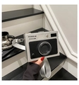 Detail showing the vintage camera-shaped crossbody bag with influencer zoom lens graphics - Silver Black