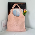 Close-up of pink knitted hollow pattern and wide shoulder strap on a large tote bag - Pink Diagonal Stripes