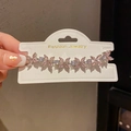 Macro shot of French style floral bracelet with pink crystals on display card - 43# Bracelet - Silver - Pink