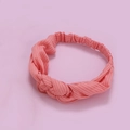 Chic pink knitted twist headband with stylish woven texture for women - Pink