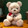 Oso de peluche beige sentado sosteniendo una rosa roja con un lazo de cinta gris - Tostado