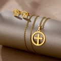 Close-up of golden stainless steel necklace and stud earrings set with hollow cross design - Round Cross Hollow (TZ-467)