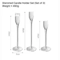 Set di 3 portacandele a calice in vetro trasparente, altezze 20 cm, 23 cm e 26 cm - Set Portacandele in Vetro con Stelo - G093-0011