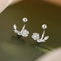 Silver flower and leaf stud earrings with sparkling cubic zirconia on green leather - Floral Leaf Rhinestone Style (A258)
