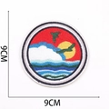 Detailed view of 9cm round embroidered patch with sun and waves design including 5.5g weight - No. 10 (Red Sun Bird Wave)