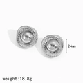Detail view of 24mm silver woven textured earrings with a polished spherical center piece - Silver Style (TE60198-S)