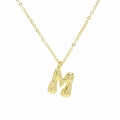 Macro detail of puffy 18k gold plated letter M bubble pendant with polished finish - Necklace M