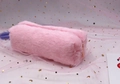 Detail view of the pink plush pencil case featuring a soft texture and matching zipper - Pink