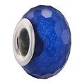 Macro shot of a faceted blue resin bead with a polished silver-tone metal core for DIY bracelets - Blue