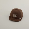 Detail of dark brown baby baseball cap with white letter embroidery and soft brim - 50cm 1-2 Years / Brown