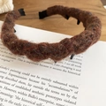 Detailed view of brown acrylic wool braided headband with internal teeth for secure fit - Headband-Coffee