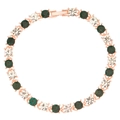 Rose gold bracelet with alternating round green and clear rhinestones on white background - Green 1079