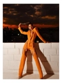 Chique oranje 3-delige set met korte blazer en uitgesneden broek bij zonsondergang sfeer - L / Oranje