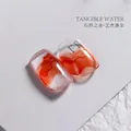 Artistic marble effect nail tips with orange ink and gold glitter finish, model N.10 - 10# (Gilding)