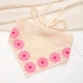 Close-up of handmade crochet triangle bandana with pink sunflower edge on white mesh - Cream Base Pink Sunflower Bandana